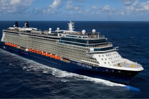 image of the front of the Celebrity Reflection Cruise ship as it cruises through the deep blue seas