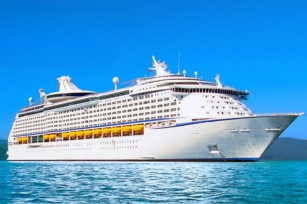 the large adventure of the Seas against the backdrop of the clear blue skies and waters.