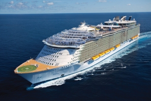 aerial view of the Harmony of the Seas featuring the logo and colours of the Royal Caribbean