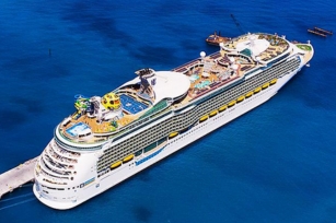 aerial view looking down on the deck of the Mariner of the Seas docked at a port against the blue seas